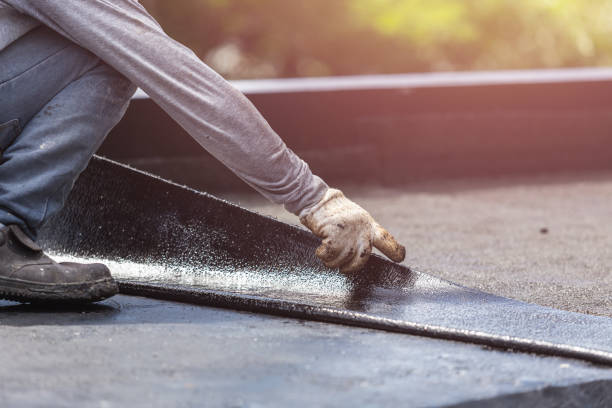 Professional Waterproofing technician working in Fairfax, VA